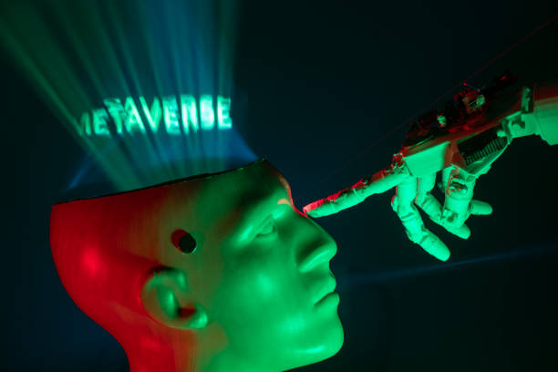 istock Humanoid robot hand touching cyborg shaped bust with text METAVERSE is written on brain, for machine learning 1372227004