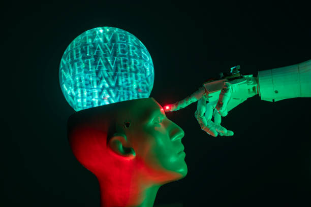 istock Humanoid robot hand touching cyborg shaped bust with brain text METAVERSE is written on, for machine learning 1372227182
