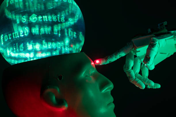 istock Humanoid robot hand touching cyborg shaped bust with text GENESIS is written on brain, for machine learning 1372227225