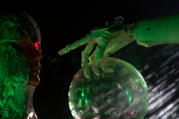 istock Robot hand pointing android with laser light in futuristic scene 1372227598