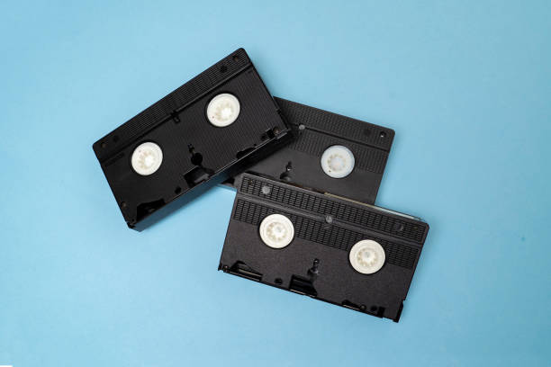 istock Three video tapes on blue background ; VHS tapes 1372232603