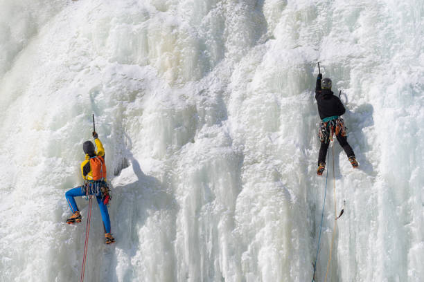Quebec city, Quebec, Canada – 30 January 2022 : Ice climbing at the Montmorency Falls national park of the Sepaq