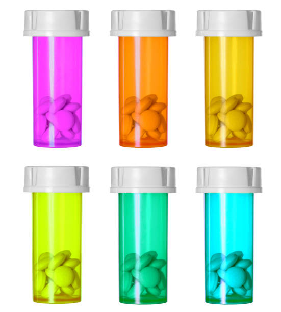 Set of Prescription pills in plastic medicine bottles on white background.