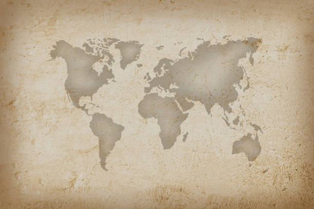 istock World map on an old paper texture background with space for text wind sea marine navigation. Design retro nautical template for marine theme border frame. 1372234549