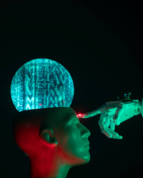 istock Humanoid robot hand touching cyborg shaped bust with brain text METAVERSE is written on, for machine learning 1372235088