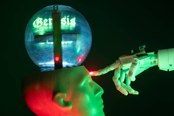 istock Humanoid robot hand touching cyborg shaped bust with text GENESIS is written on brain, for machine learning 1372235185