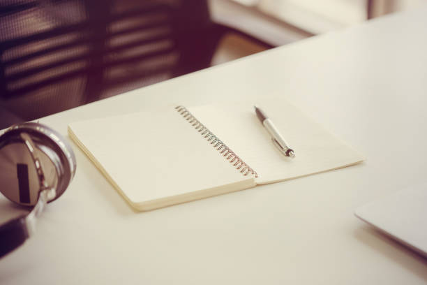 istock Office supplies on table in modern office room, Business office 1372247084