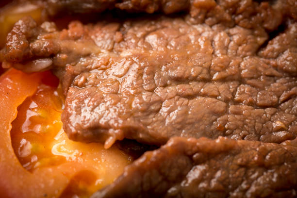 Beef with tomato over rice