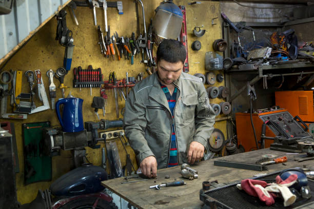 istock Close-up portrait of locksmith at workplace 1372255570