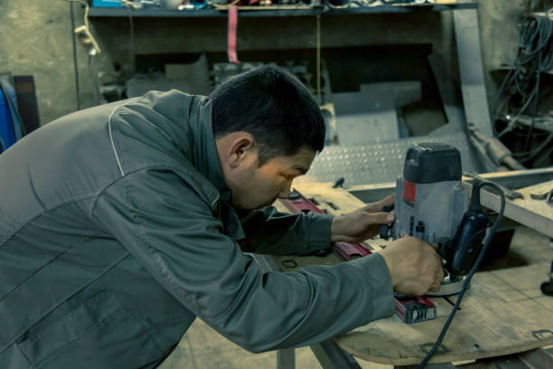istock Close-up portrait of locksmith at workplace 1372257201