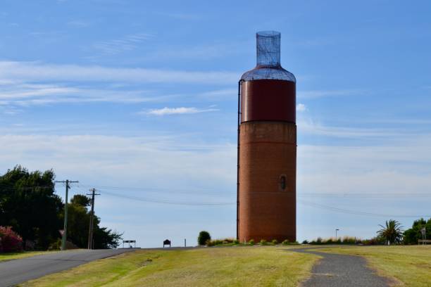 Big wine bottle is a landmark outside the wine region town of Rutherglen in Australia stock photo