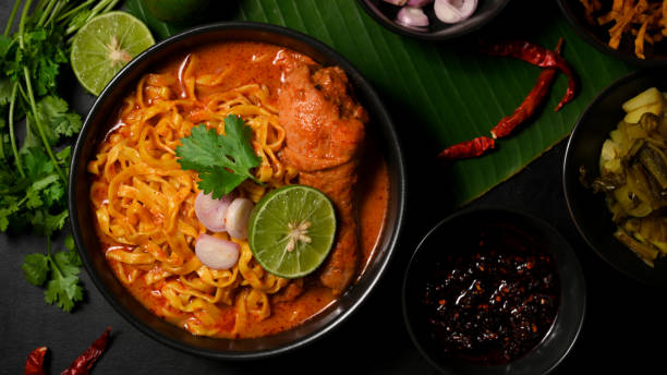 istock Flavourful Khao Soi Kai, creamy and slightly spicy yellow curry with chicken 1372259873