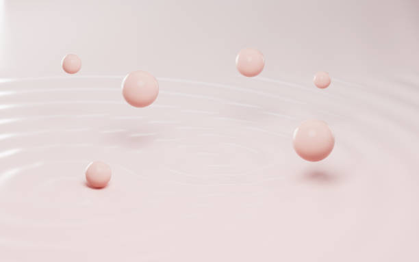 istock Pink spheres floating on the water, 3d rendering. 1372260653