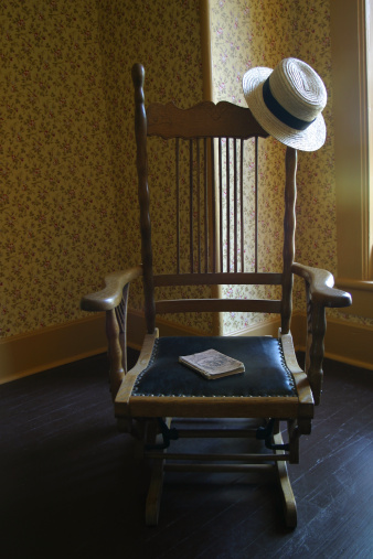 An old wooden chair in a 18th century home.