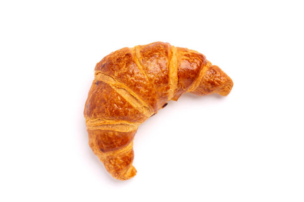 delicious fresh croissant isolated on white background - bakery bread breakfast close up imagens e fotografias de stock