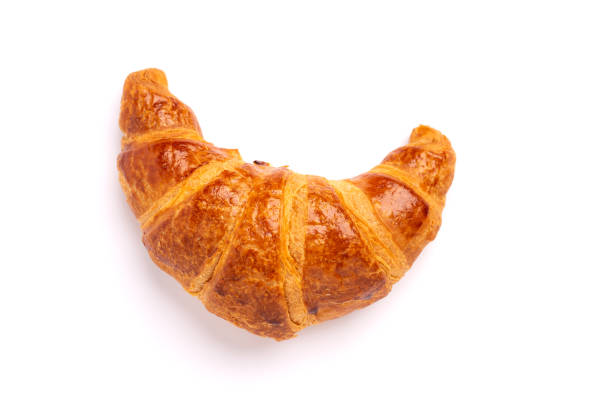 istock Delicious fresh croissant isolated on white background 1372262775