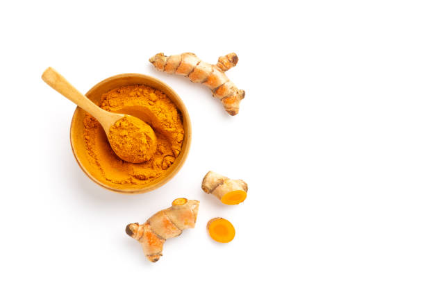 istock Turmeric powder and turmeric root isolated on white background ,Top view 1372262776