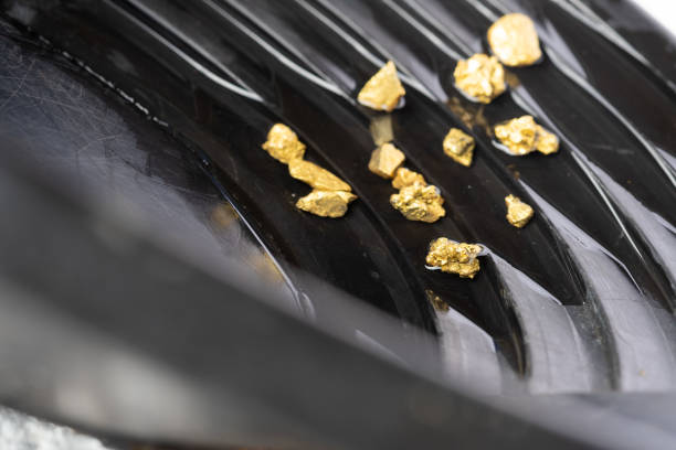 Close-up scene of  the brass materials scrap from turning process. The pile of lathe chips.
