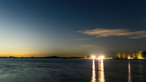 istock Starry night by the lake in Lobos 1372267670