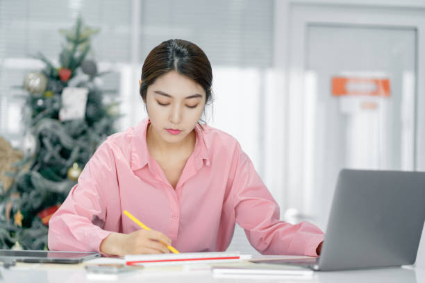 istock Beautiful female designers work in the office 1372278695