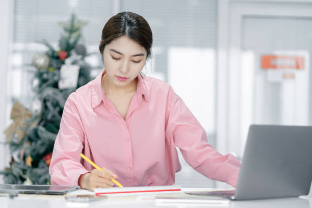 istock Beautiful female designers work in the office 1372279918