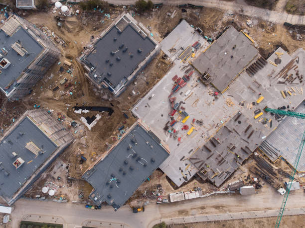istock Busy Construction Site and Construction Equipment Aerial top view 1372280491