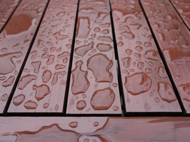 istock Wet wooden table after the rain 1372283495