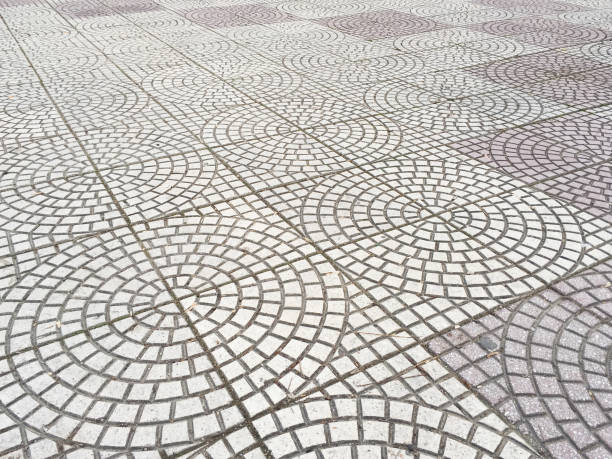 istock Circle and square shape outdoor stone flooring background 1372284316