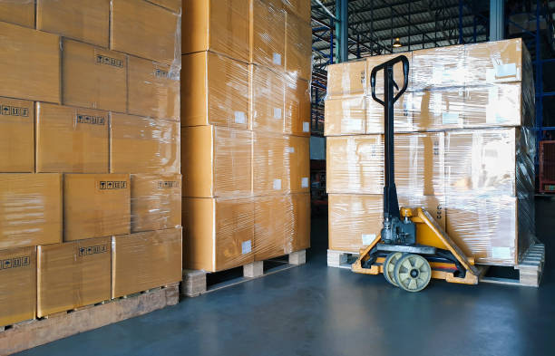 istock Packaging Boxes on Pallets Racks in Storage Warehouse. Supply Chain. Storehouse Shipment Goods. Distribution Warehouse Shipping Logistics. 1372286777