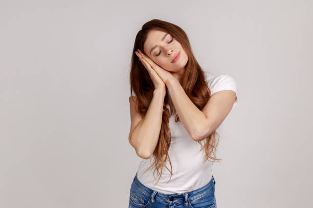 istock Woman sleeping laying down on her palms, having comfortable nap and resting, dozing off. 1372289543