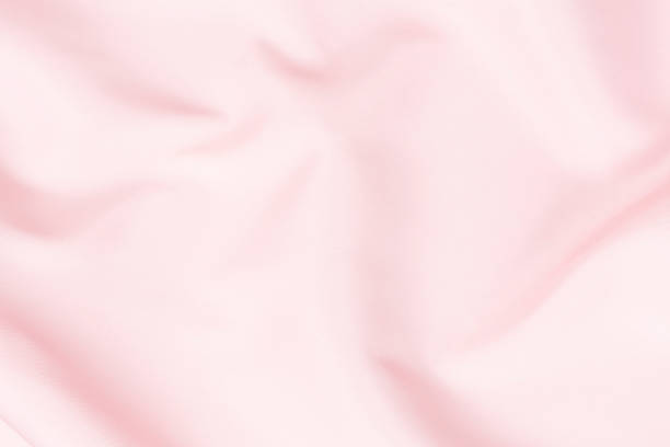 istock pink silk fabric on the floor 1372295533