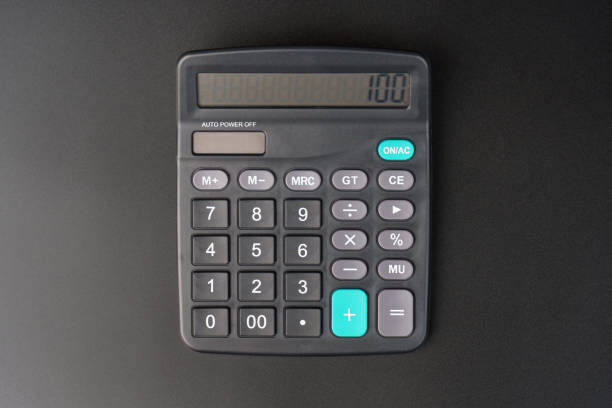 istock top view of a black calculator on a black 1372297087