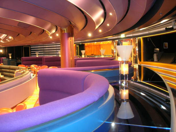 a lounge looks so clean wonderful and full of color with lights everywhere