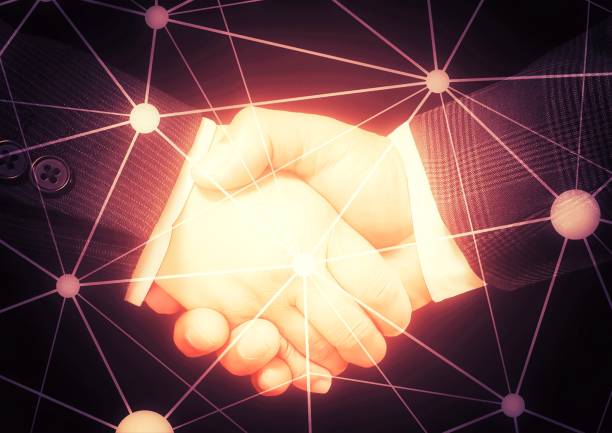 istock 3D illustration that combines communication network and handshake with the concept of global business 1372301231