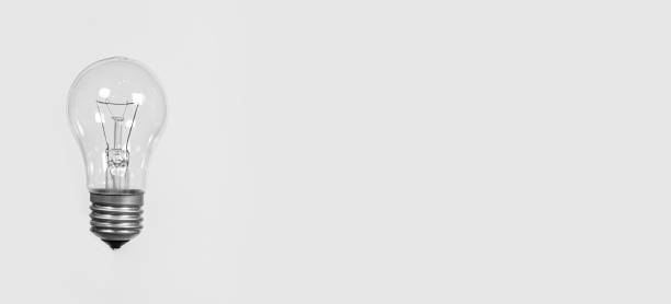 istock Light bulb on a gray background, banner with space for text 1372305105