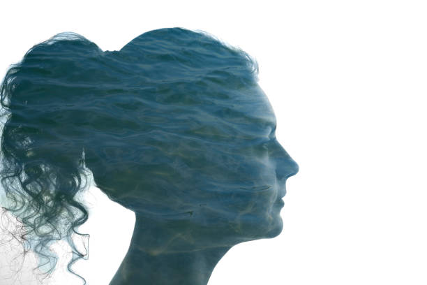 istock Silhouette of a woman's face filled with water. 1372307821