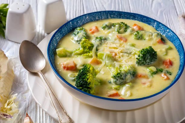 istock Broccoli cheese soup in a bowl, top view 1372307995