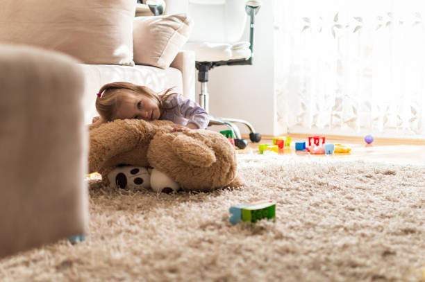 istock Playful baby girl 1372309440
