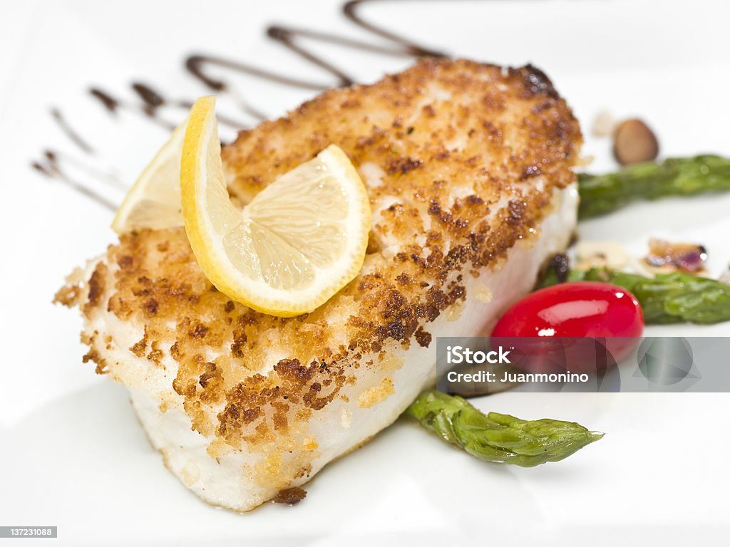 Padella filetto di pesce arrosto - Foto stock royalty-free di Filetto