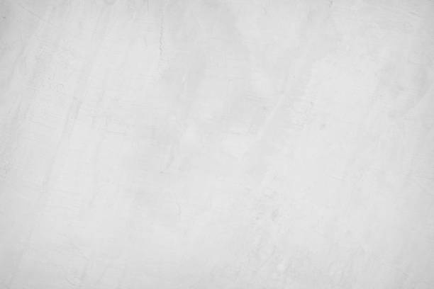 istock White concrete texture wall background. Pattern floor rough grey cement stone. Wallpaper paper  sand surface clean polished. Photo abstract gray construction old grunge for design urban decoration. 1372312608