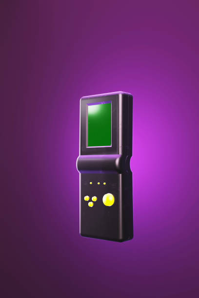 istock 3D illustration black retro electronic portable game console, 1980 90s style, on lilac background,  3D rendering 1372315293
