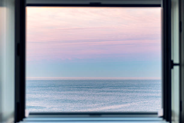 istock Sunrise over Atlantic Ocean through the open window 1372316195