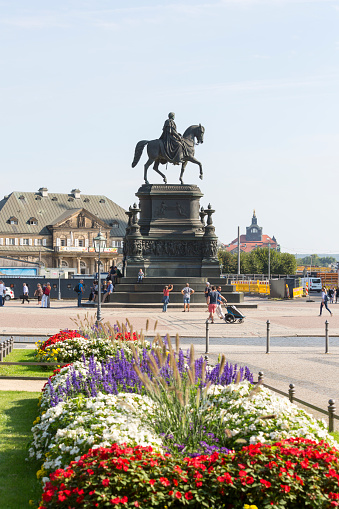 Dresden, Germany - September 23, 2020 : Equestrian statue of King Jan Wettin on Theatre Square in front of Semperoper, famous opera house near the Elbe River in the historic centre of city