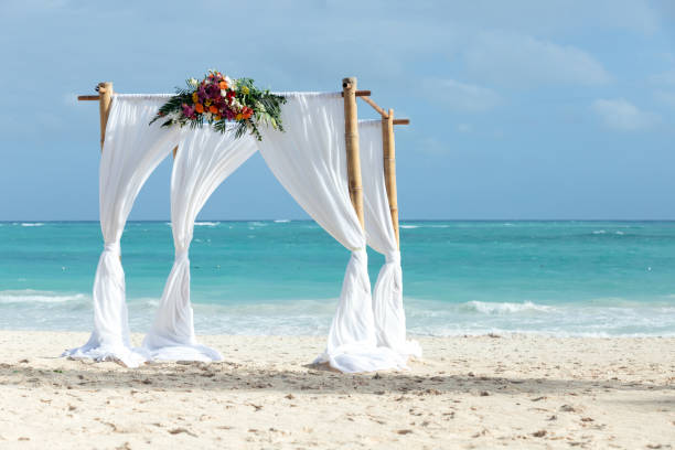 istock An empty gazebo with white curtains and flowers 1372316893