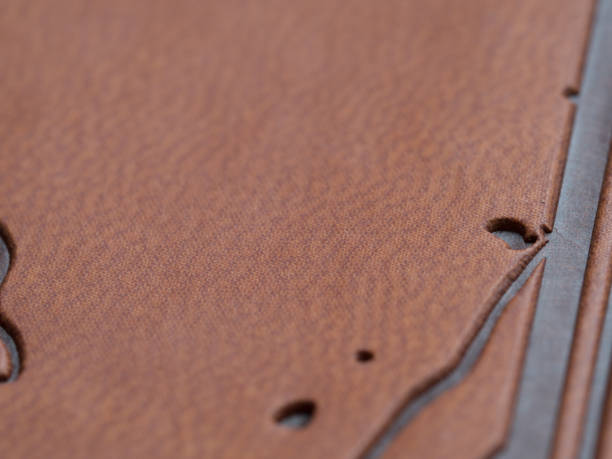 istock Brown color background with abstract print on top and copy space 1372318203