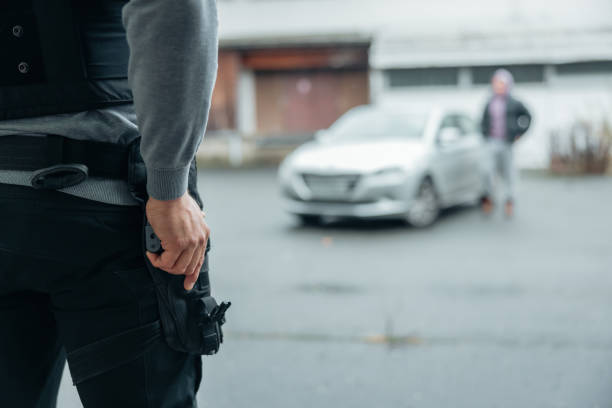 istock Police officer grabbing a gun for a suspect 1372319794