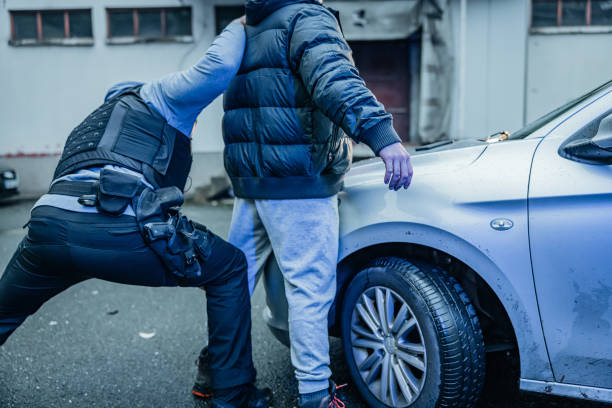 istock Policeman searching a suspect for illegal things during investigation 1372320947