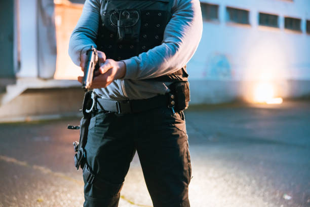 istock Task force officer preparing for special operation on the street 1372321371