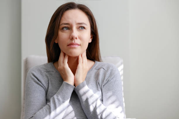 Young woman suffering from cold stock photo