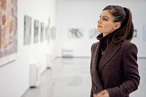 Portrait of woman in a gallery